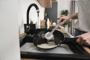 Close-up of cookware cleaning – cookware care with The Kitchen Wholesale products